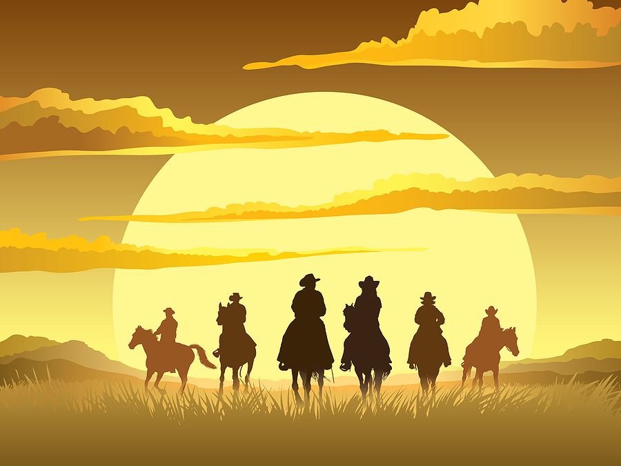 cowboys at dusk